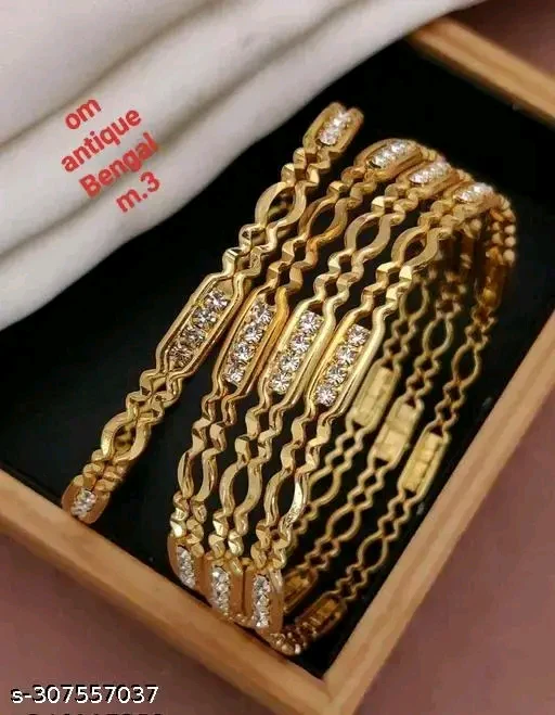 Beautiful traditional jewellery bangles for women and girls jellyElegant Gold-Plated Traditional Jelly Bangles for Women & Girls - Set of 4